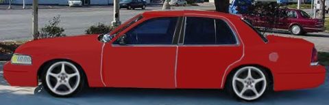 1987 Ford Crown Victoria LTD - A red sedan is parked on the street, with another vehicle visible in the background.