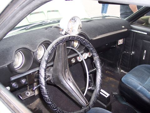 1972 Ford Ranchero - The interior of a 1972 Ford Ranchero shows a tachometer and a custom steering wheel.