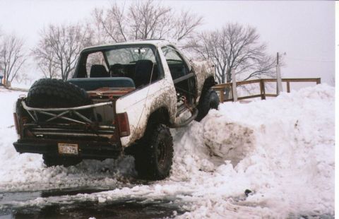 1980 Ford Bronco - The Bronco has been stabled too long...so I hit the snow piles across the lake from my house. AND HIGH CENTERED!