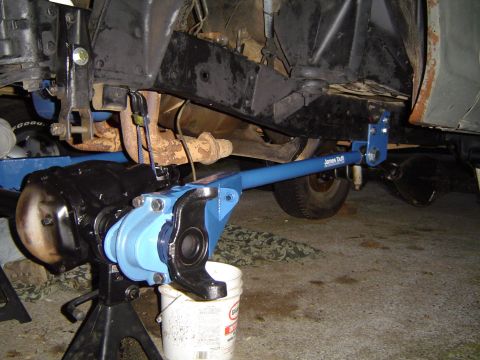 1978 Ford Bronco - Front axle and suspension components of a 1978 Ford Bronco, blue James Duff parts.