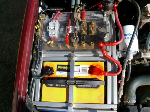 1988 Ford Bronco - Custom battery box setup with Duralast battery and electrical components.