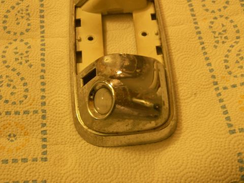 1978 Ford Bronco - Dome light assembly with chrome trim and clear lens, likely from an older vehicle.