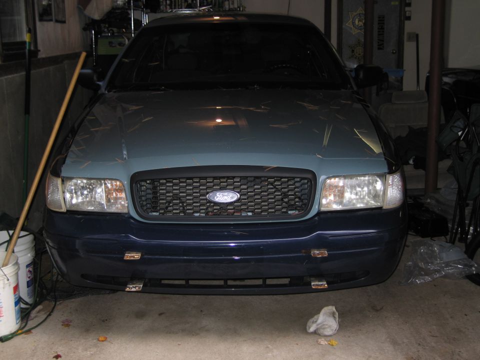 Light blue and dark blue 1991 Ford Crown Victoria LTD front view
