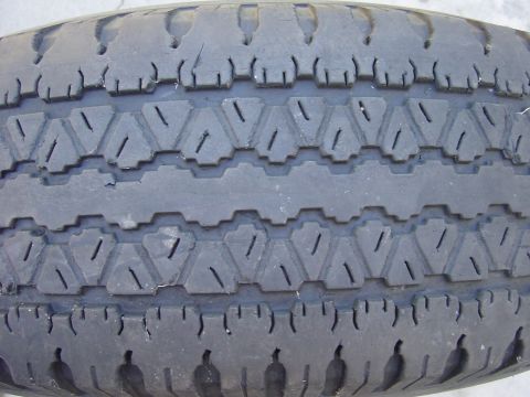 1983 Ferrari Enzo - Close-up view of a tire tread pattern, showing wear and tear.