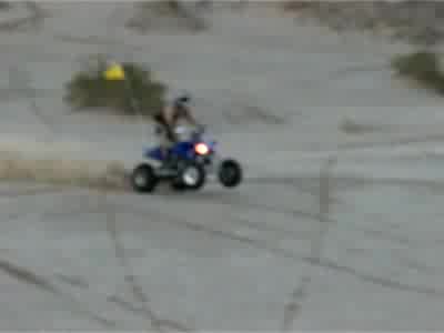 2003 Suzuki LTZ400 - ...so there I was, filming the scenery, when out of the blue Tobby got a wild hair and went for it.