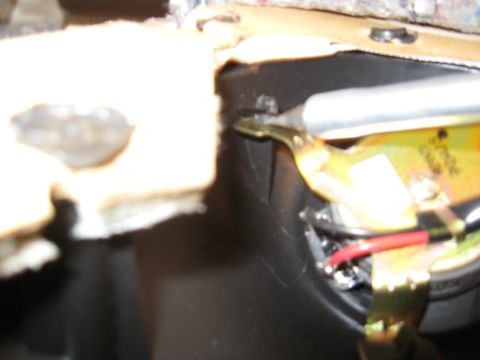 2002 Pontiac Trans Am - Detail of car interior speaker wiring, possibly during installation or repair.