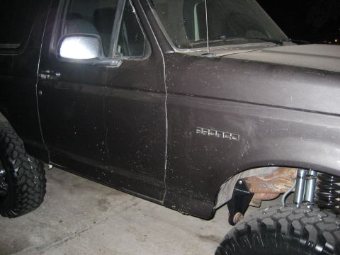 1993 Ford Bronco - This 1993 Ford Bronco has a lifted suspension and a side fender badge.