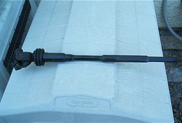 driveshaft with u-joints and rubber boot