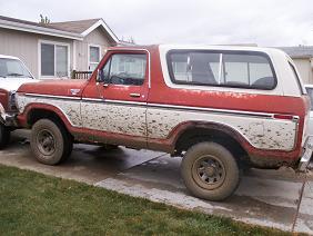 1984 Ford Bronco - This two-tone red and white Ford Bronco appears to be from the 1980-1986 model years, based on its body style.