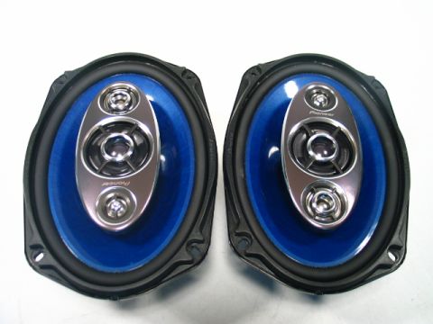 1993 Ford C-350 (Centurion Conversions) - Two Pioneer car speakers are shown, each a blue cone and a silver center with the Pioneer logo visible.