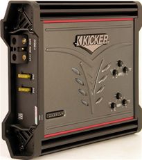 1993 Ford C-350 (Centurion Conversions) - A Kicker amplifier, likely for a car stereo system, is shown with its connection terminals and adjustment knobs visible.