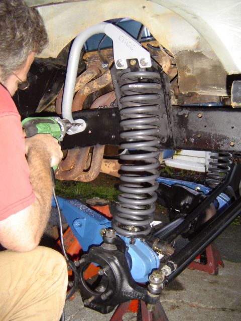 1978 Ford Bronco - Todd drilling the lower mounts