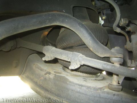 1994 Chevrolet Silverado 3500 - Undercarriage view shows air suspension bellows and connecting rods.