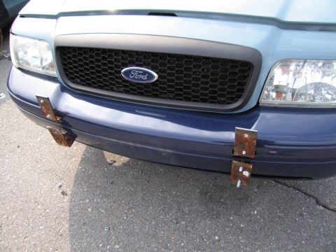 1991 Ford LTD Crown Victoria - Ford Crown Victoria front end shows a honeycomb grille and custom bumper mounts.