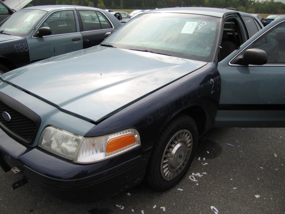 1991 Ford Crown Victoria LTD, front quarter view, light blue and dark blue