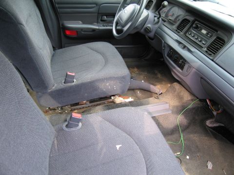 1991 Ford LTD Crown Victoria - Interior view of a car, showing the front seats, dashboard, and steering wheel.