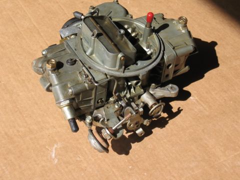 1968 Shelby GT500 - Close-up of a Holley carburetor, a key engine component.