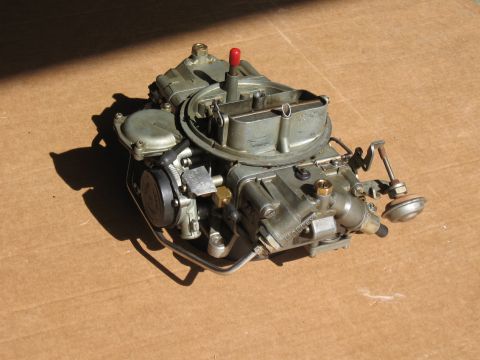 1968 Shelby GT500 - A close-up view of a Holley carburetor, a key component in many older vehicles.