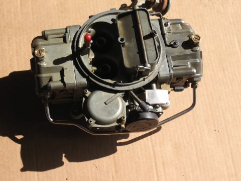 1968 Shelby GT500 - A Holley carburetor, a critical engine component, is shown from a top-down perspective.
