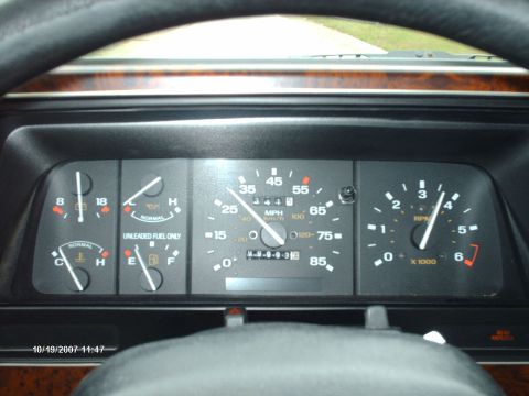 1989 Ford Ranger - Interior view of a 1989 Ford Ranger's dashboard, displaying the odometer reading of 34,448 miles.