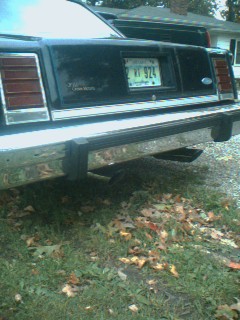 1985 Ford Crown Victoria LTD - Rear view of a 1985 Ford Crown Victoria LTD, showing its taillights and license plate.