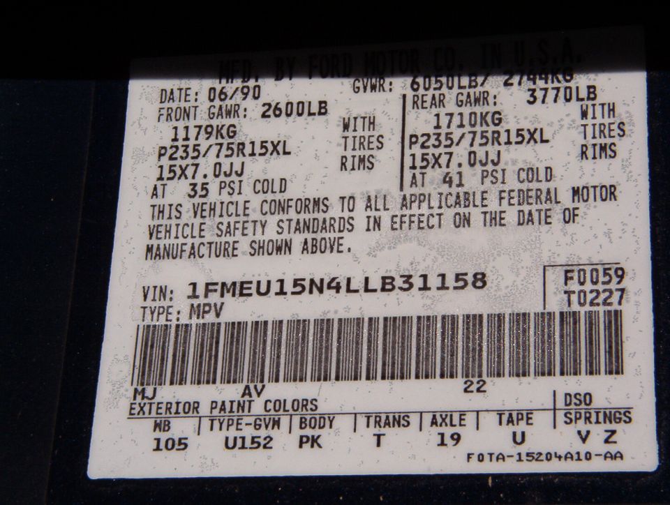 Ford door VIN sticker showing VIN 1FMEU15N4LLB31158, date 06/90