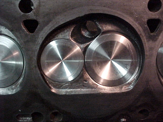 New stainless valves are 11/32" stem size. The intakes are 2.15, the exhausts are 1.76".
