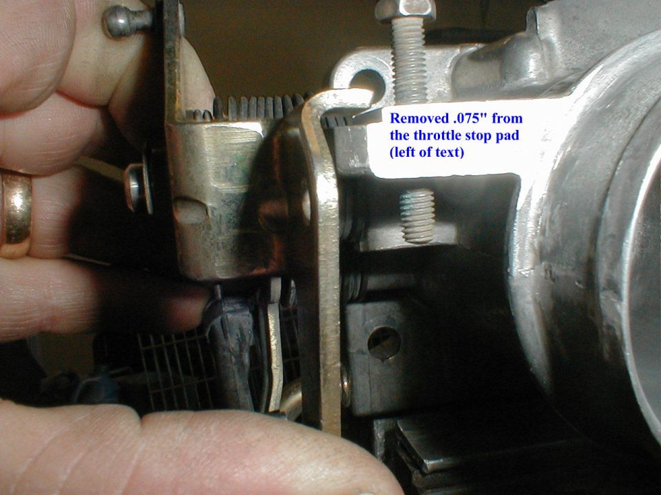Close-up of throttle stop pad modification with text indicating .075" removed