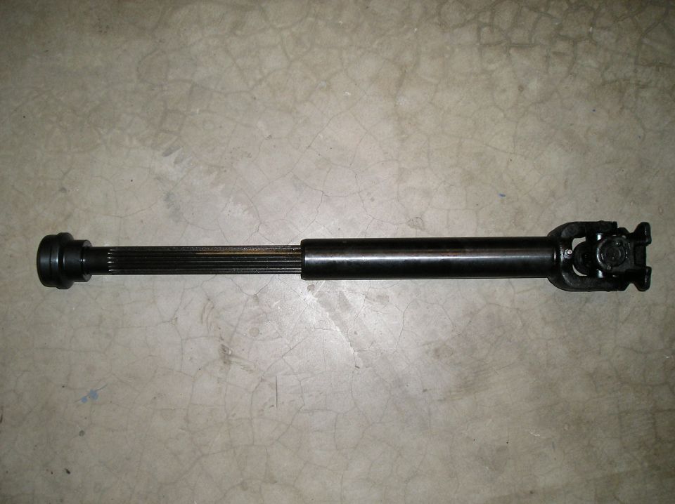 Driveshaft with U-joint on a concrete floor
