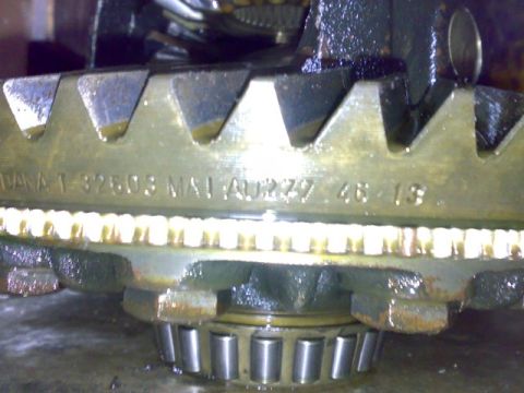 1995 Ford F-150 - Close-up of a differential gear showing part numbers and manufacturing codes.