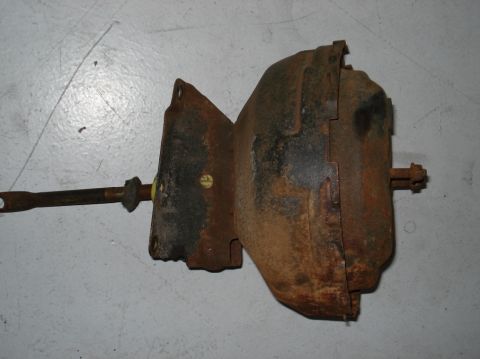 1979 Chevrolet C/K Pickup - Brake booster assembly, appears to be from an older vehicle, showing significant rust.