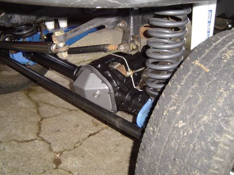 1978 Ford Bronco - Front axle and suspension components are visible in this close-up shot.