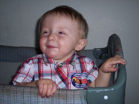 1972 Ford Ranchero - Toddler in a high chair wearing a shirt with Lightning McQueen on it.