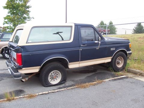 1990 Ford Bronco - 3 bald tires and one is a different size