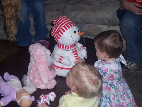 1972 Ford Ranchero - Children and toys are gathered together, with a snowman plush as a central figure.