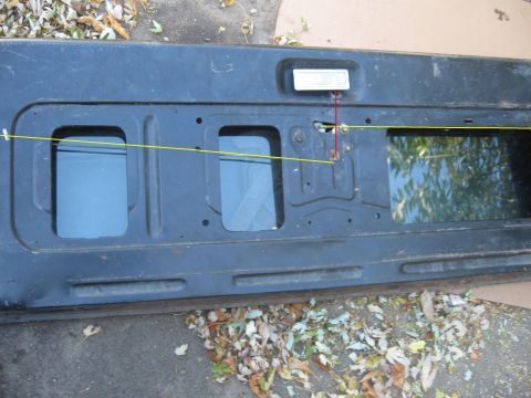 1979 Ford Bronco - Close-up of a tailgate, possibly from a Ford Bronco, with measurement lines indicating a modification or modification.