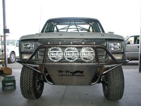 1980 Ford Bronco - Front view of a modified 1980 Ford Bronco, equipped with off-road lights and a roll cage.