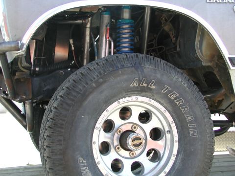 1980 Ford Bronco - Custom suspension components are visible on this off-road vehicle's front wheel well.