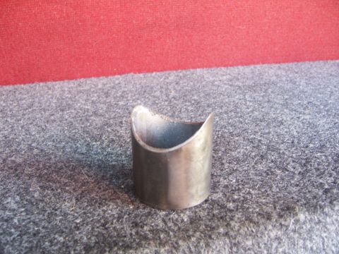 1991 Ford Bronco - A single metal slider part is shown against a textured background.