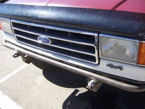 1991 Ford Bronco - Front view of a 1991 Ford Bronco showing the grille, headlights, and a custom bumper.