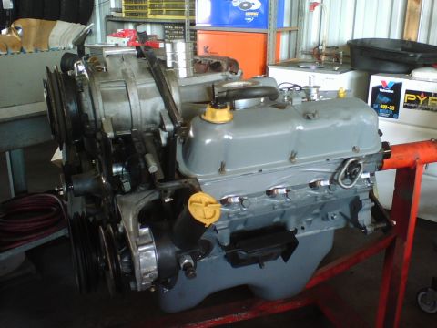 1984 Ford Bronco - Engine assembly on a stand, likely for repair or rebuild.