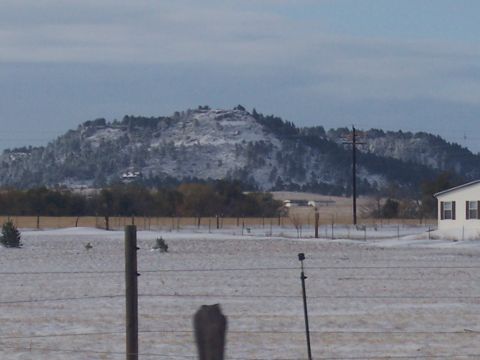 1972 Ford Ranchero - A winter scene with snow covering the landscape and a house visible on the right side.