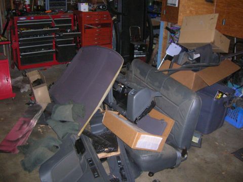 1985 Ford Bronco - pile of parts in the garage