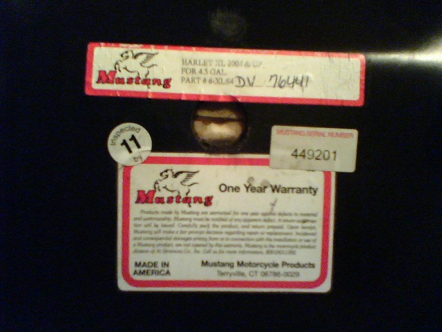 Mustang motorcycle parts labels with 'Harley XL 2004 & up' and 'One Year Warranty'
