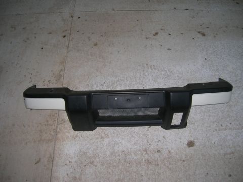 1999 Land Rover Discovery II - This is a front bumper part, likely for a Land Rover Discovery II, shown against a concrete floor.