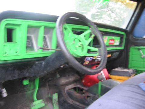 1979 Ford F-150 - The interior of a 1973 Ford F-Series truck is painted bright green, including the dashboard and steering wheel.