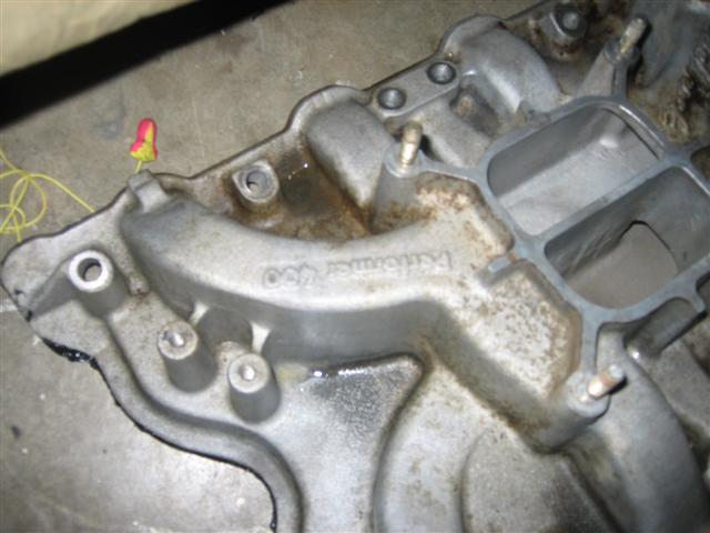 Aluminum intake manifold with 'Performer 460' cast into it