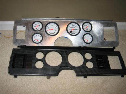 1900 Yugo Vega - Instrument cluster gauges including tachometer, speedometer, fuel, volts, and water temperature are shown.
