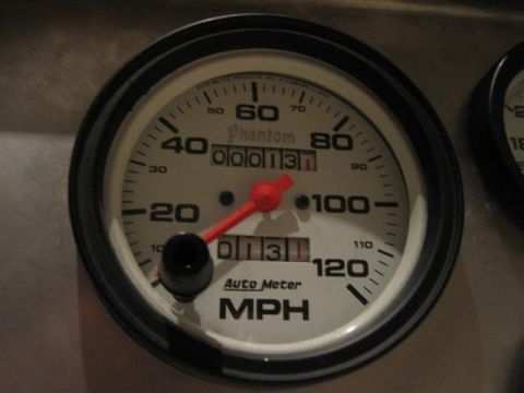 1900 Yugo Vega - Speedometer shows 131 miles. The gauge is an Auto Meter Phantom model.