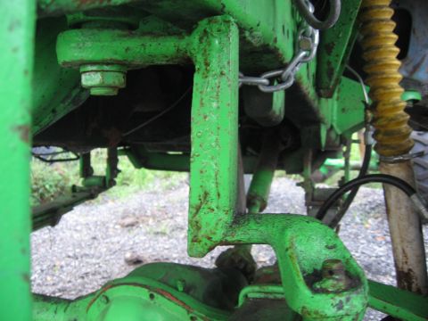 1979 Ford F-150 - Undercarriage view of a heavily modified truck, showing suspension and frame components.